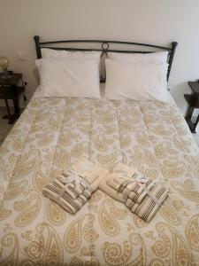 Ένα ή περισσότερα κρεβάτια σε δωμάτιο στο Riohome