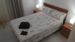 Een bed of bedden in een kamer bij El racó de Pals