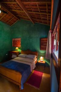 A bed or beds in a room at Lagamar Ecohotel