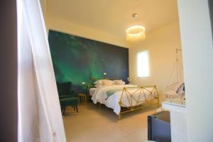 Voodi või voodid majutusasutuse Burano Yellow Villa toas