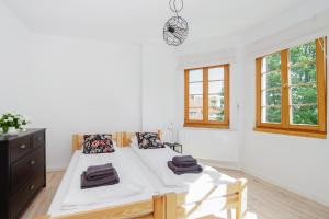 Łóżko lub łóżka w pokoju w obiekcie Sopotel
