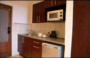 Kuchyň nebo kuchyňský kout v ubytování Ocean View Villas A08 + 3 fotografie