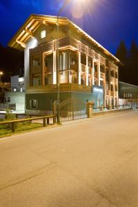 a building with a street light in front of it at Residence Deborah in Madesimo