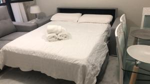 Postel nebo postele na pokoji v ubytování Apartment Lucena Center Bajo Parking Gratis