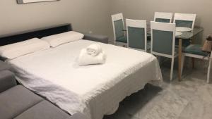 Postel nebo postele na pokoji v ubytování Apartment Lucena Center Bajo Parking Gratis