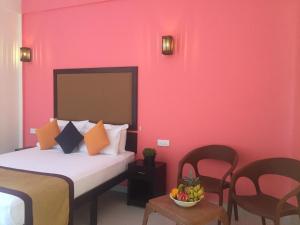 Postel nebo postele na pokoji v ubytování Organic Garden Resort Sigiriya