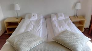 Katil atau katil-katil dalam bilik di Hotel Stadarborg
