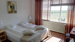 Katil atau katil-katil dalam bilik di Hotel Stadarborg