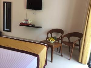 TV a/nebo společenská místnost v ubytování Organic Garden Resort Sigiriya