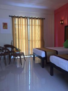 Postel nebo postele na pokoji v ubytování Organic Garden Resort Sigiriya