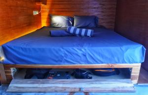 Postel nebo postele na pokoji v ubytování Kaniu Capsule Hostel
