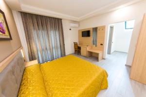 TV a/nebo společenská místnost v ubytování Western Star Hotel