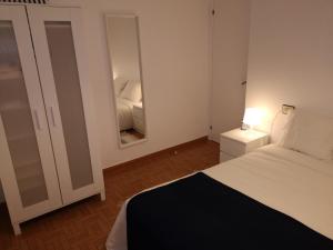 Łóżko lub łóżka w pokoju w obiekcie Apartamento marinero