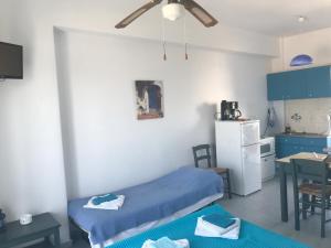 A kitchen or kitchenette at Studios Panorama Drios