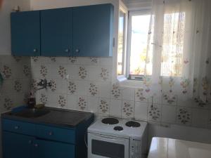 A kitchen or kitchenette at Studios Panorama Drios