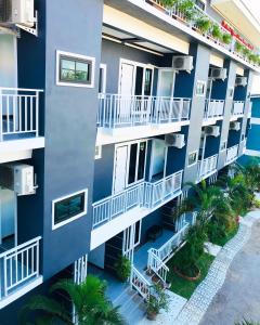 an aerial view of an apartment building with balconies at Sabaidee mansion&hotel in Ko Lanta