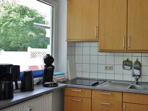 Køkken eller tekøkken på Fewo D am Kurpark + 23 billeder