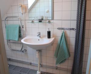 Ett badrum på Hotell Oskar