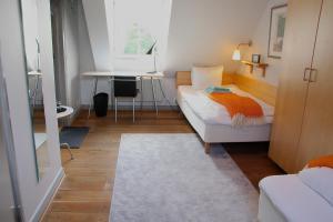 Letto o letti in una camera di Hotell Oskar