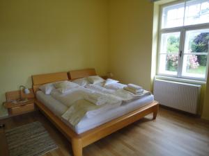 Postel nebo postele na pokoji v ubytování Zeilinger Villa