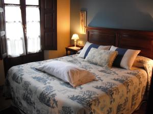 Postel nebo postele na pokoji v ubytování Hotel rural La Llastra + 2 fotografie