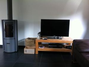 En tv och/eller ett underhållningssystem på Maison contemporaine au Coeur des Ardennes Belges