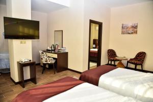 TV a/nebo společenská místnost v ubytování Supreme Hotel Baku