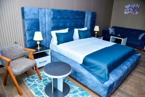 Postel nebo postele na pokoji v ubytování Supreme Hotel Baku