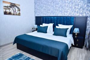 Postel nebo postele na pokoji v ubytování Supreme Hotel Baku