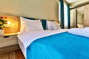 Letto o letti in una camera di Montebay Perla
