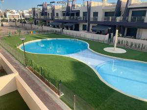 Bazén v ubytovaní Casa Higuericas- Penthouse Beach - Torre de la Horadada alebo v jeho blízkosti