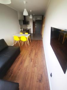 Posedenie v ubytovaní Apartament Cyprys 2