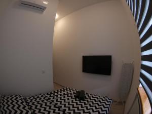 Telewizja i/lub zestaw kina domowego w obiekcie Bulwary Apartments