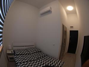 Łóżko lub łóżka w pokoju w obiekcie Bulwary Apartments