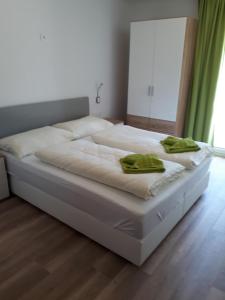 Posteľ alebo postele v izbe v ubytovaní Appartements Bleistattblick