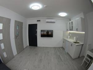 Kuchnia lub aneks kuchenny w obiekcie Bulwary Apartments