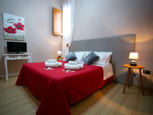 Postel nebo postele na pokoji v ubytování B&B A Modo Mio
