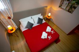 Postel nebo postele na pokoji v ubytování B&B A Modo Mio