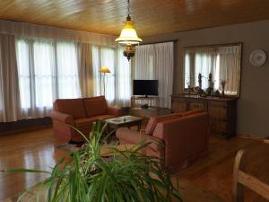TV a/nebo společenská místnost v ubytování Hospedium Hostal Almanzor