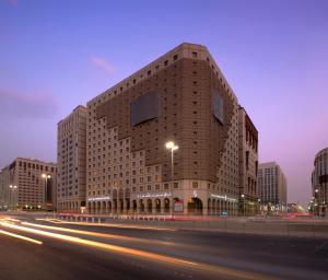 a large building on the side of a street at Saja Al Madinah in Al Madinah