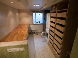 a bathroom with a toilet and a sink in a room at Town House close to Center in Reykjavík