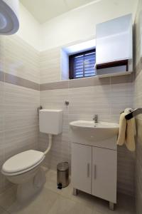 Kúpeľňa v ubytovaní Apartmani Šime
