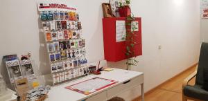 a room with a white desk and a red cabinet at Barcelona Rooms 294 in Barcelona