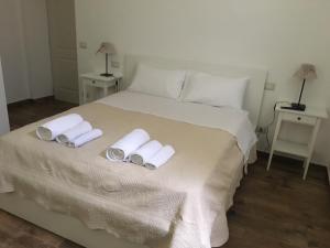 Postel nebo postele na pokoji v ubytování L’Acerba B&B