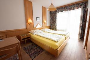 Katil atau katil-katil dalam bilik di Gasthof Speneder