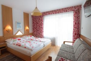 Postel nebo postele na pokoji v ubytování Gasthof Speneder