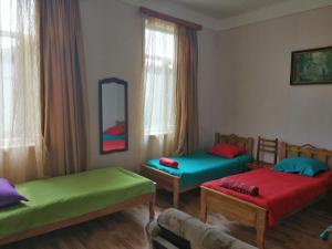 Ένα ή περισσότερα κρεβάτια σε δωμάτιο στο Guesthouse SANIKO