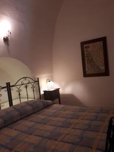Postel nebo postele na pokoji v ubytování Masseria Cassiere