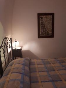Postel nebo postele na pokoji v ubytování Masseria Cassiere