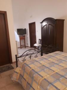 Postel nebo postele na pokoji v ubytování Masseria Cassiere